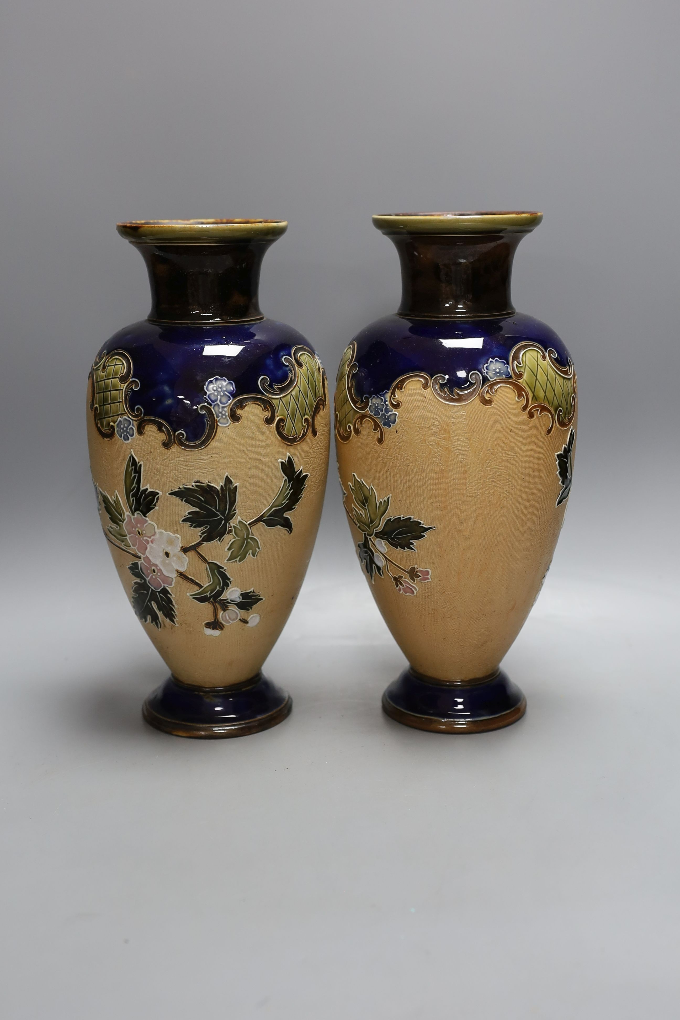 A pair of Doulton Lambeth vases, c.1900, 30cm tall